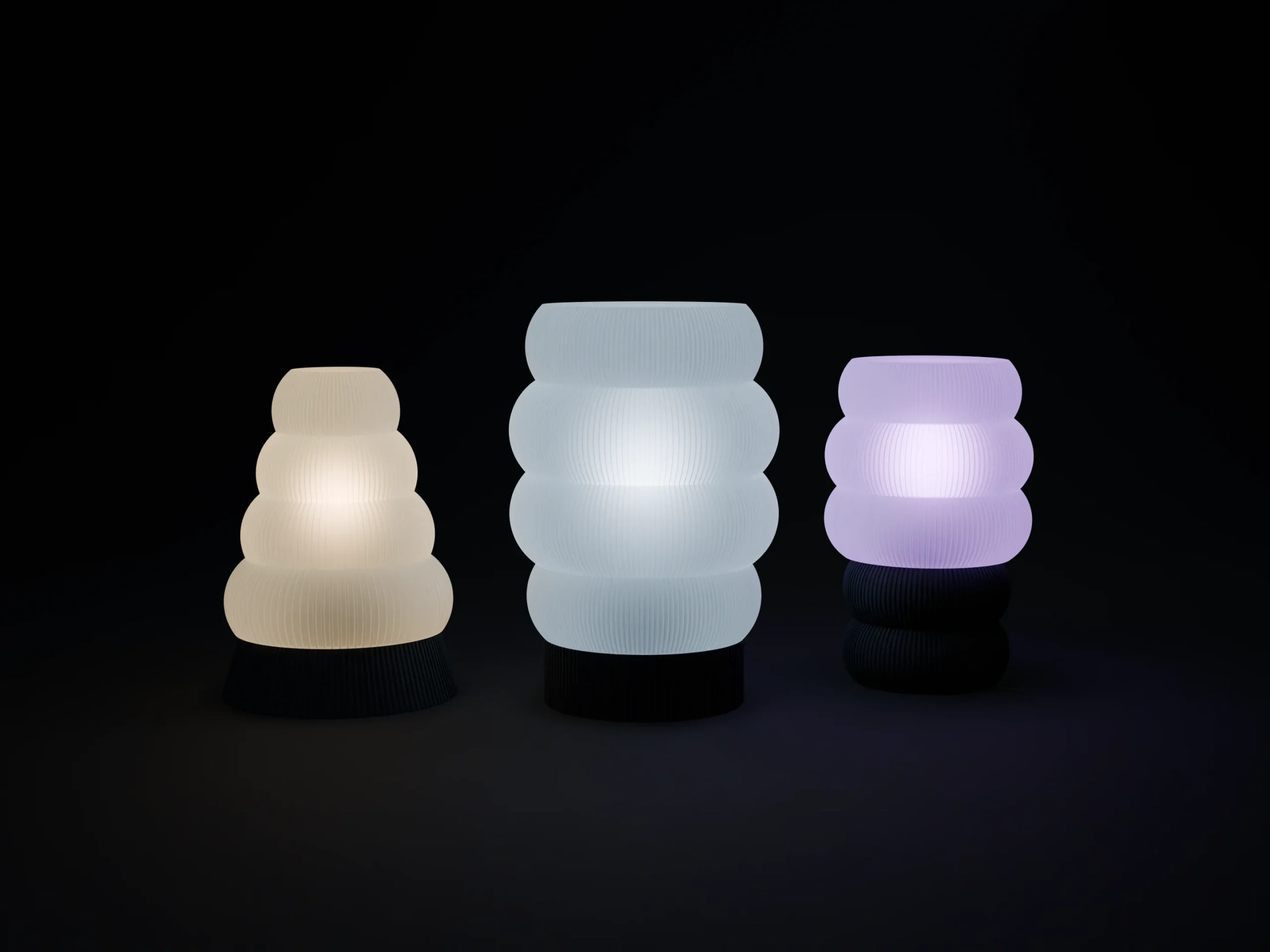 Three HALO lamps lit warm white, cool white and RGB